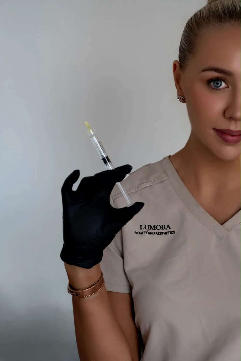 Emily Scovell, aesthetic practitioner at Lumora Beauty and Aesthetics